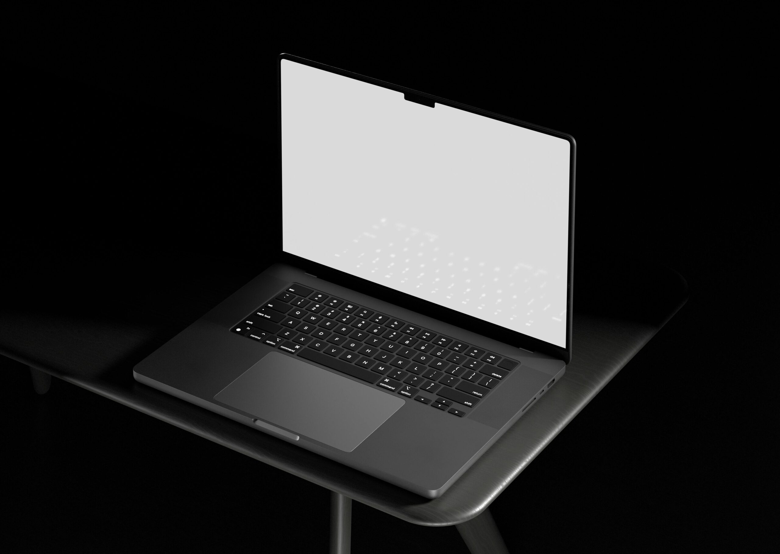 Open laptop with a blank white screen on a table in a dark setting, suitable for mockups and designs.